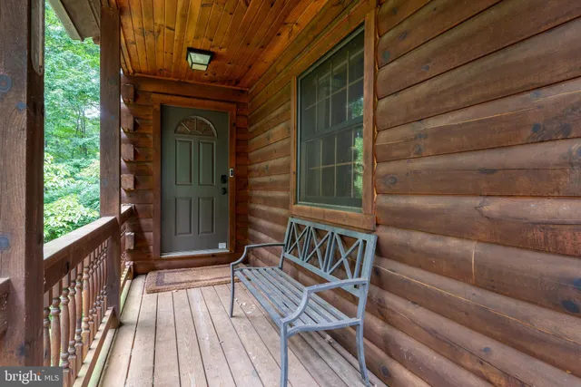 a view of front door and deck
