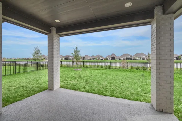 a view of a back yard from a big room