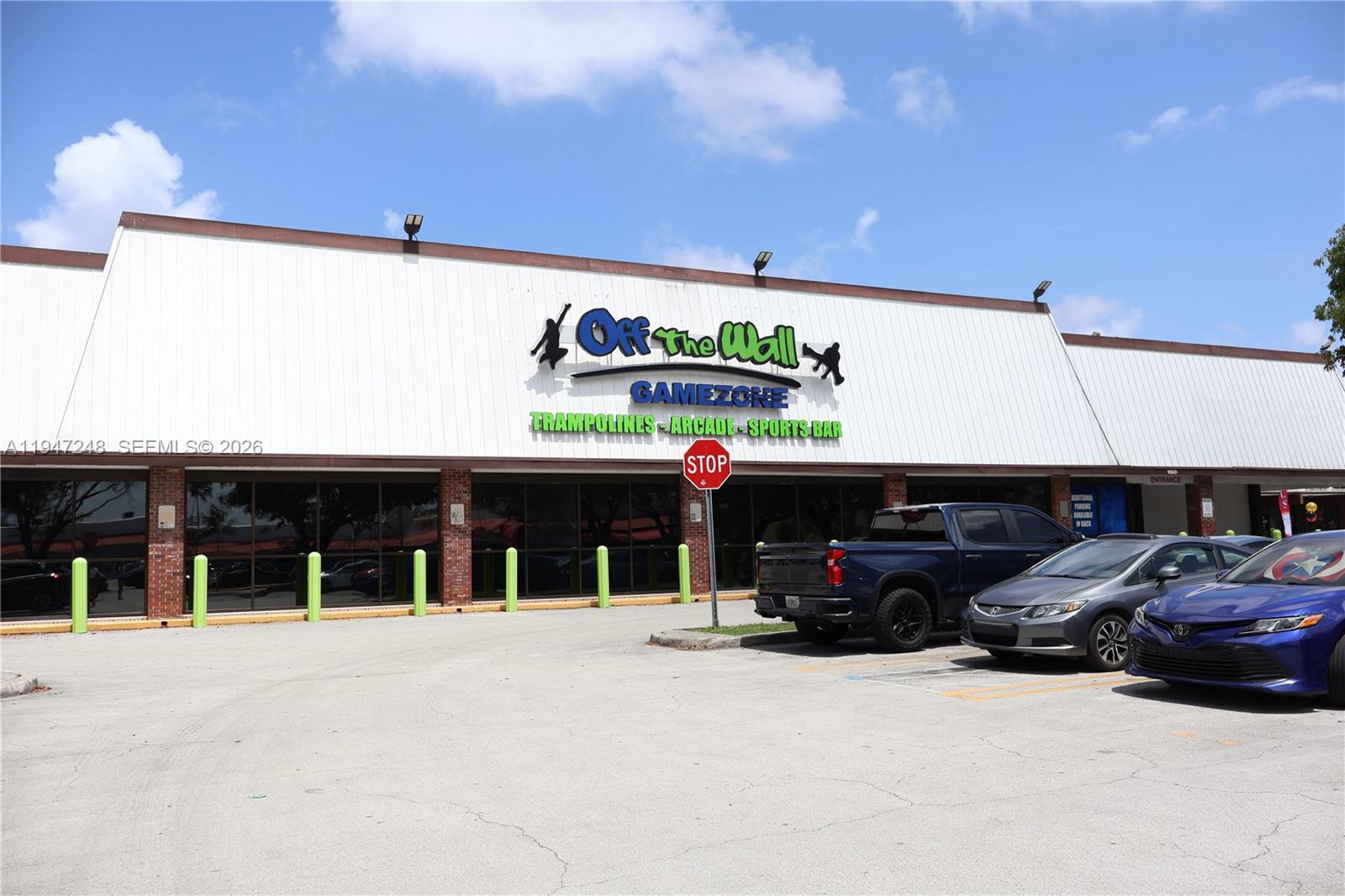 13935 Southwest 84th Street, Unit 905 Miami, FL 33183 - Photo 30 of 33 a view of car parking