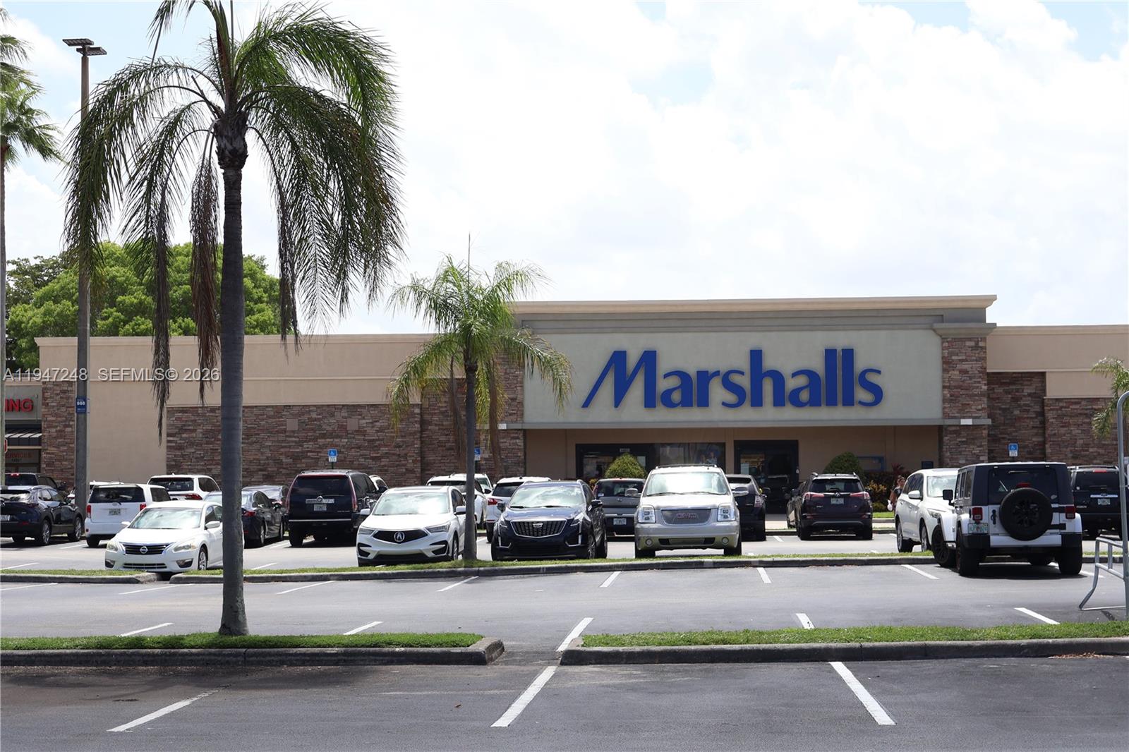 13935 Southwest 84th Street, Unit 905 Miami, FL 33183 - Photo 33 of 33 a car parked in front of a store