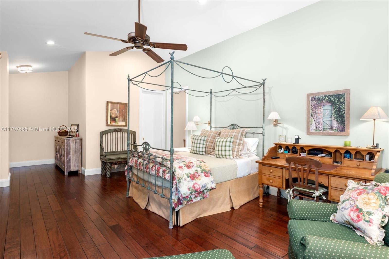 7400 Southwest 47th Court Miami, FL 33143 - Photo 19 of 74 a bedroom with furniture and a wooden floor