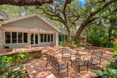 a view of workspace with furniture and window