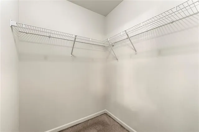 a view of a room with racks on the wall