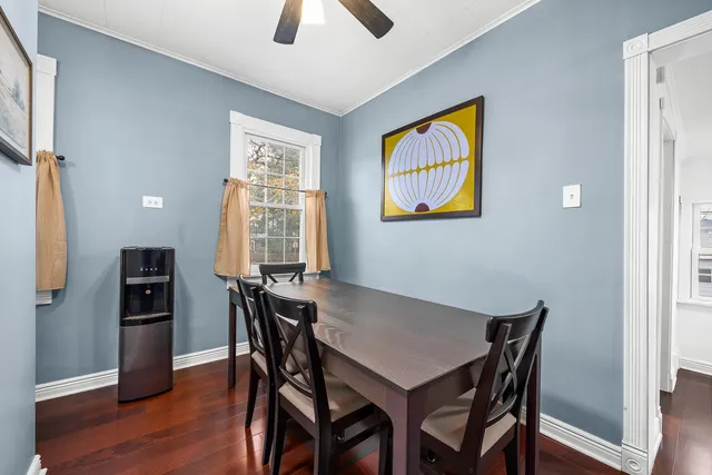 a bedroom with furniture and a chandelier
