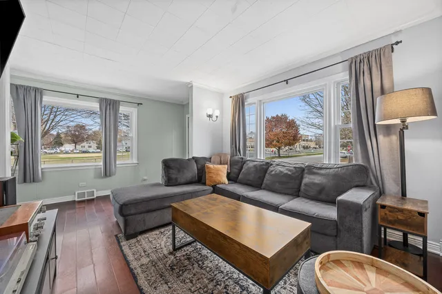 a kitchen with stainless steel appliances a stove a refrigerator and cabinets