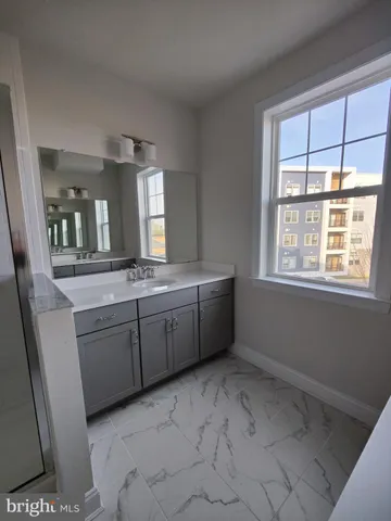 a room with a cabinets and a sink