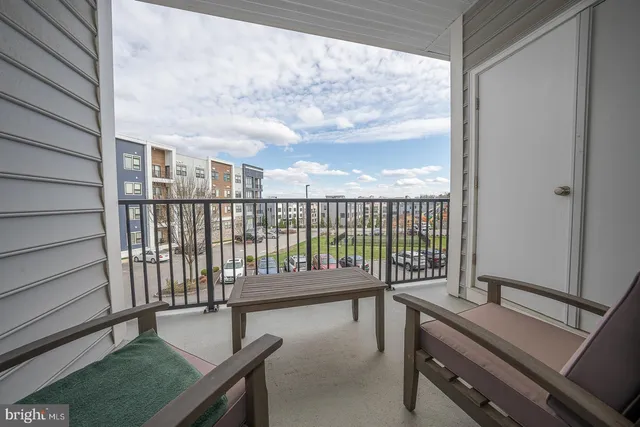 a balcony with wooden floor