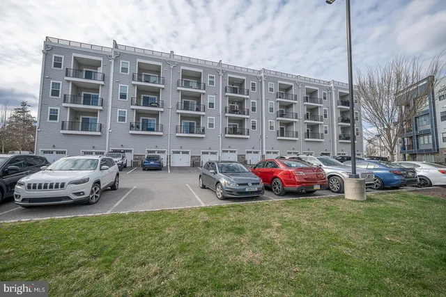 a cars parked in front of a building