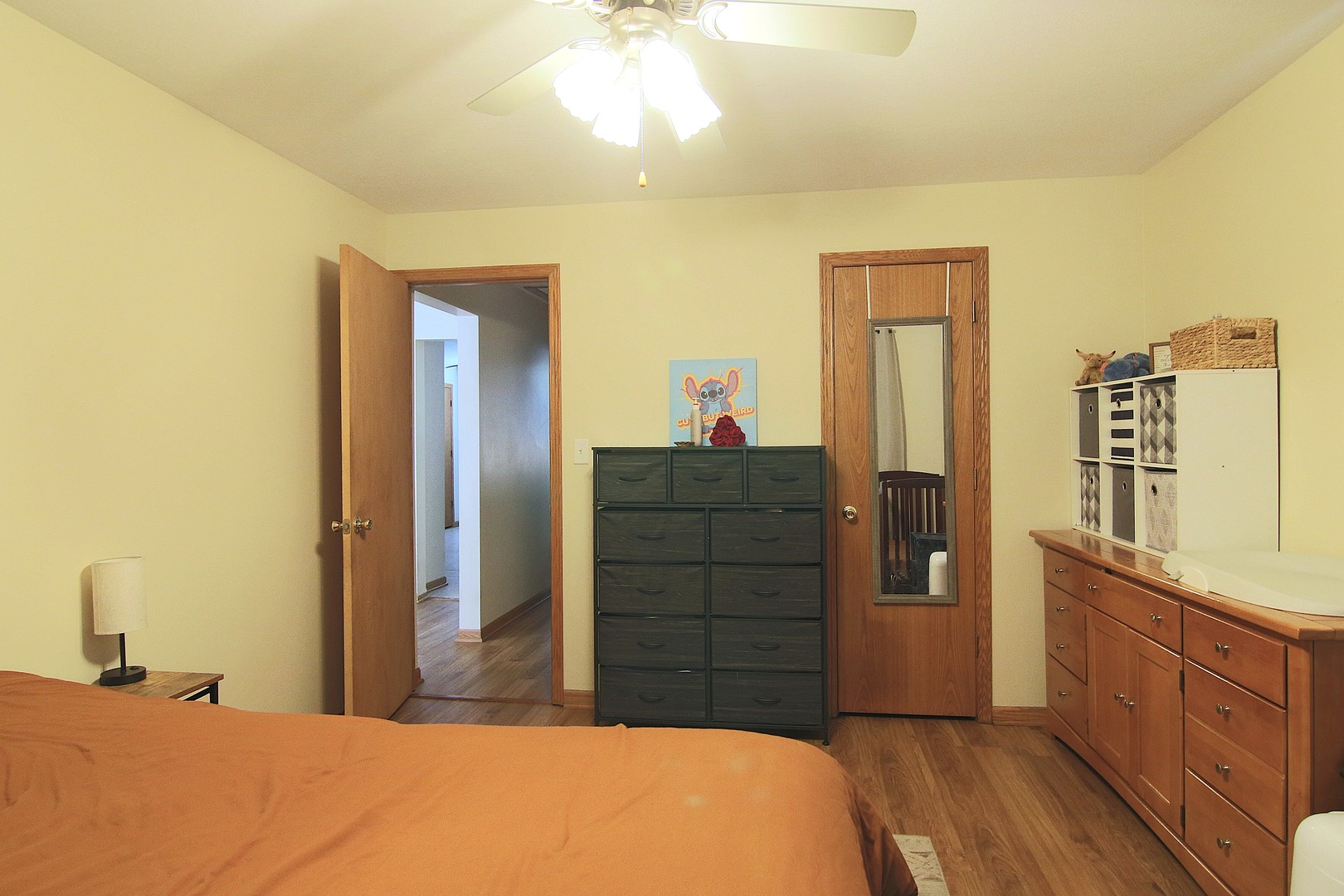 105 North Maple Street Grant Park, IL 60940 - Photo 8 of 14 a bedroom with a bed and cabinets