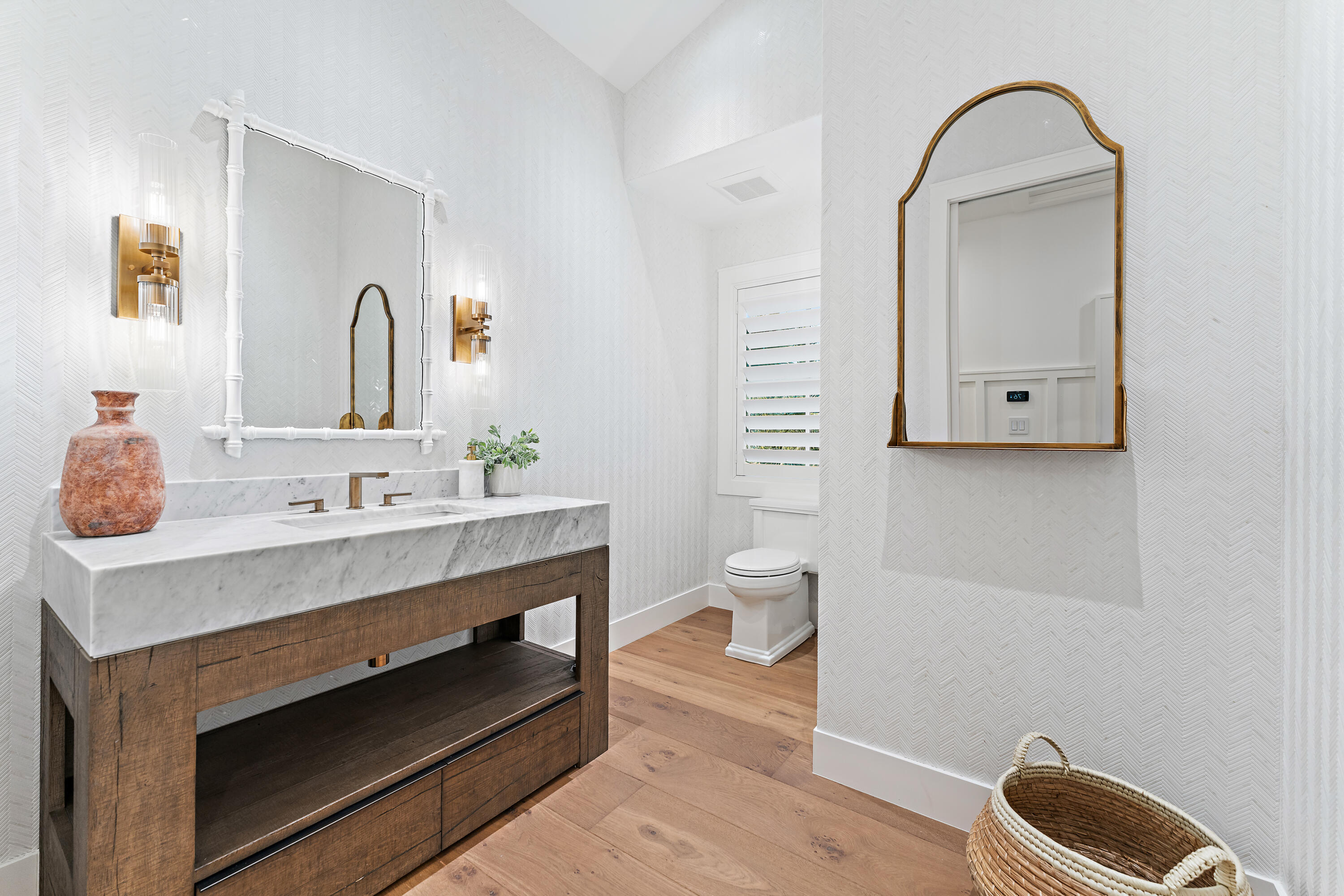 116 South Sewalls Point Road Sewall's Point, FL 34996 - Photo 46 of 92 a bathroom with a sink and a mirror