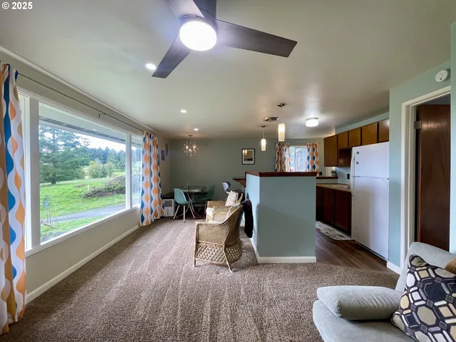 a kitchen with stainless steel appliances a refrigerator and a sink