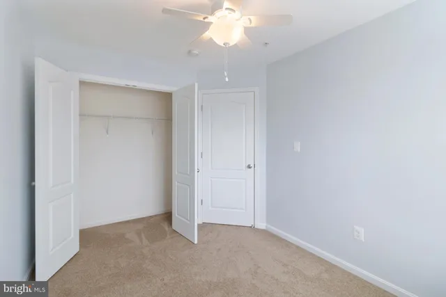 a view of swimming pool with outdoor seating