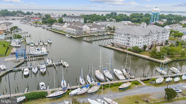 a view of a building and a people on a street