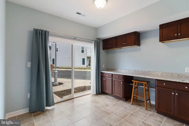 a view of storage and utility room with washer and dryer