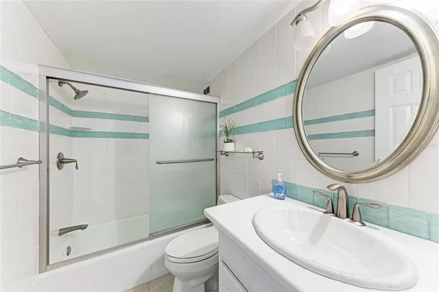 $799,999 | 5200 Gulf Drive, Unit 107, Holmes Beach, FL 34217