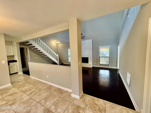 a view of a hallway with entryway