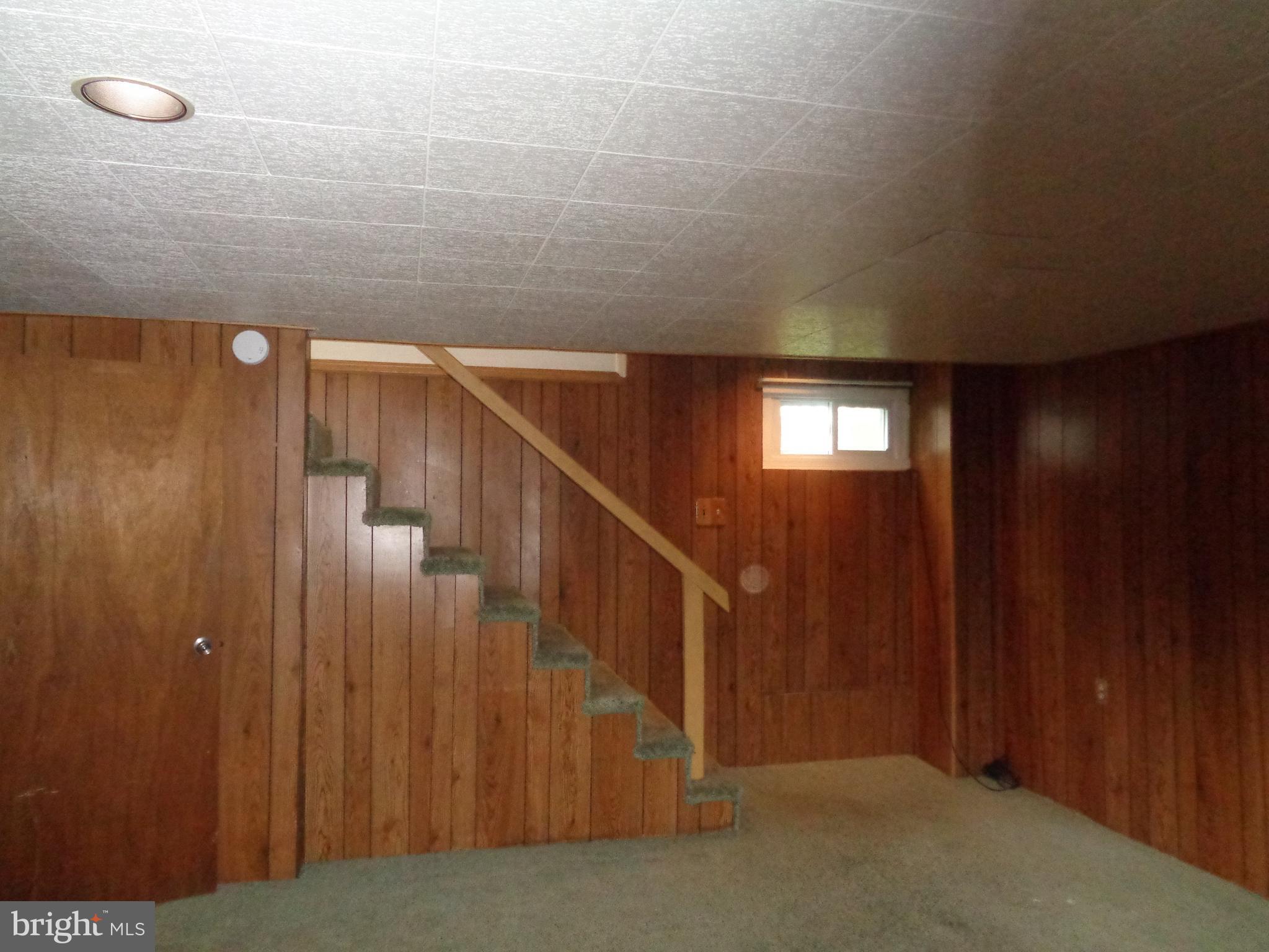 6213 Marlora Road Baltimore, MD 21239 - Photo 18 of 26 a view of entryway with wooden floor