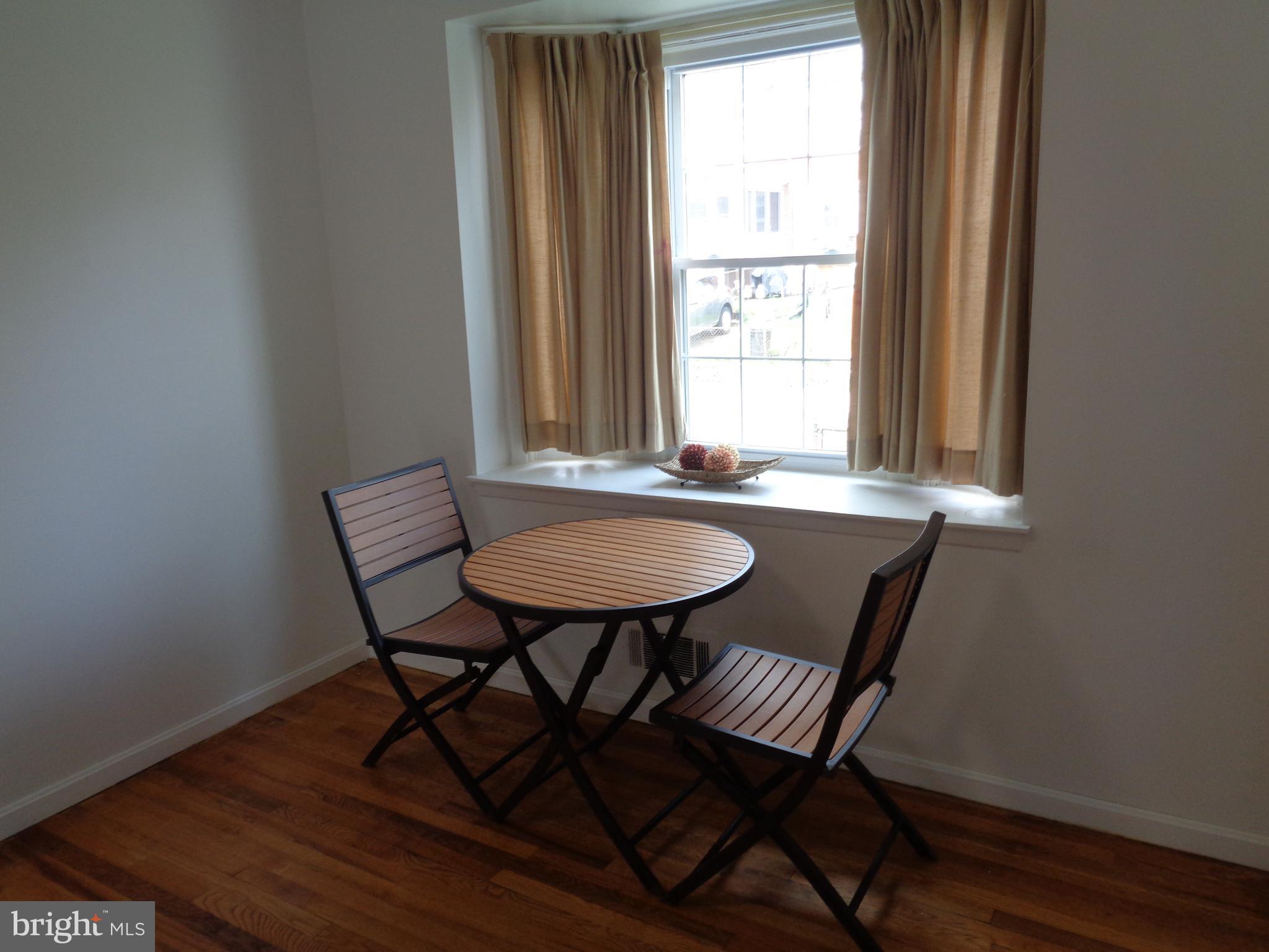 6213 Marlora Road Baltimore, MD 21239 - Photo 5 of 26 a view of a table and chairs in a room
