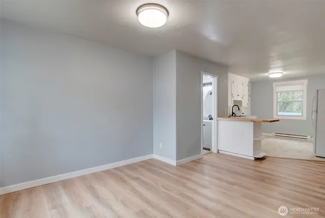 a view of a kitchen and a sink