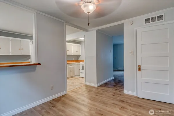 a view of a livingroom with shelves