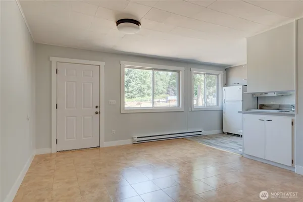 a view of a kitchen and window