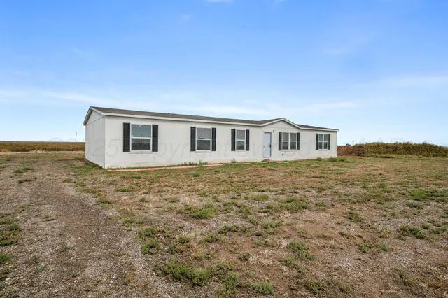 a large building with a ocean view