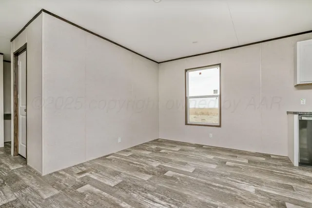 a kitchen with stainless steel appliances granite countertop a stove a refrigerator and a refrigerator