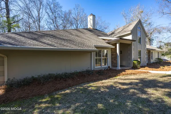 a view of a house with a patio