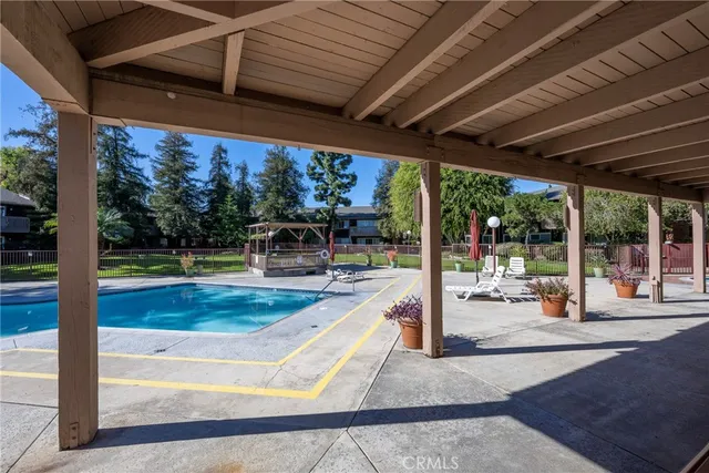 an aerial view of a house with outdoor space patio and outdoor seating
