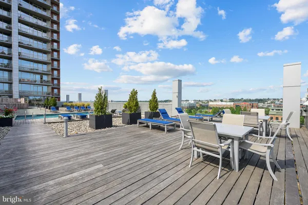 a view of a terrace with seating area