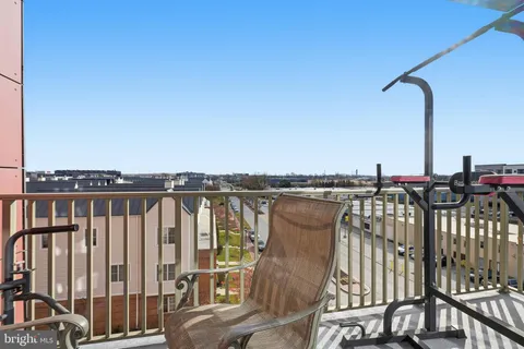 a view of balcony with furniture