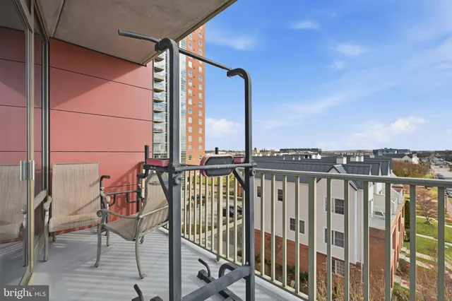 a view of balcony with furniture