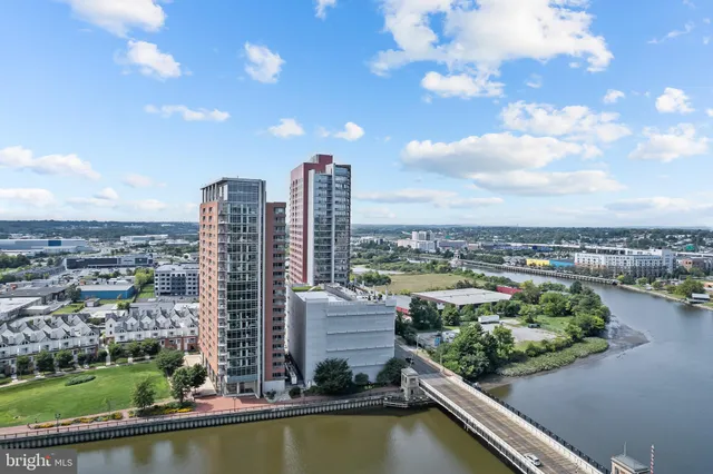 a view of a city with tall buildings