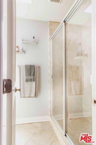 a living room with furniture and a gate