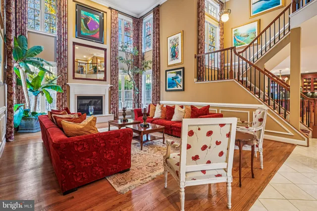 a bedroom with bed and wooden floor