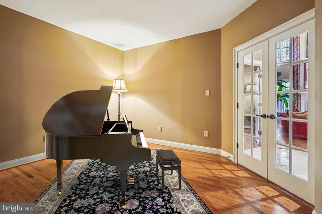 a bathroom with a tub shower and sink