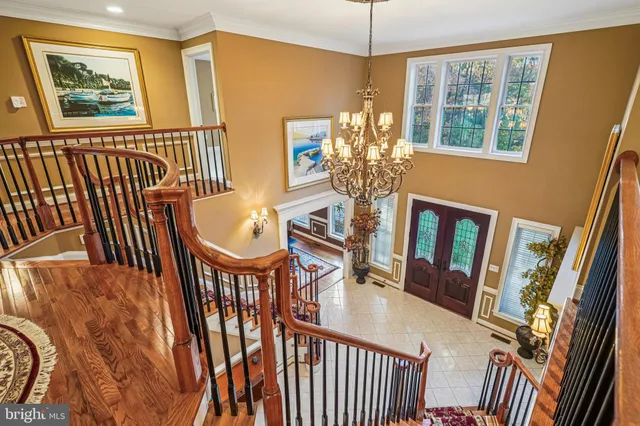 a room with furniture and pool table