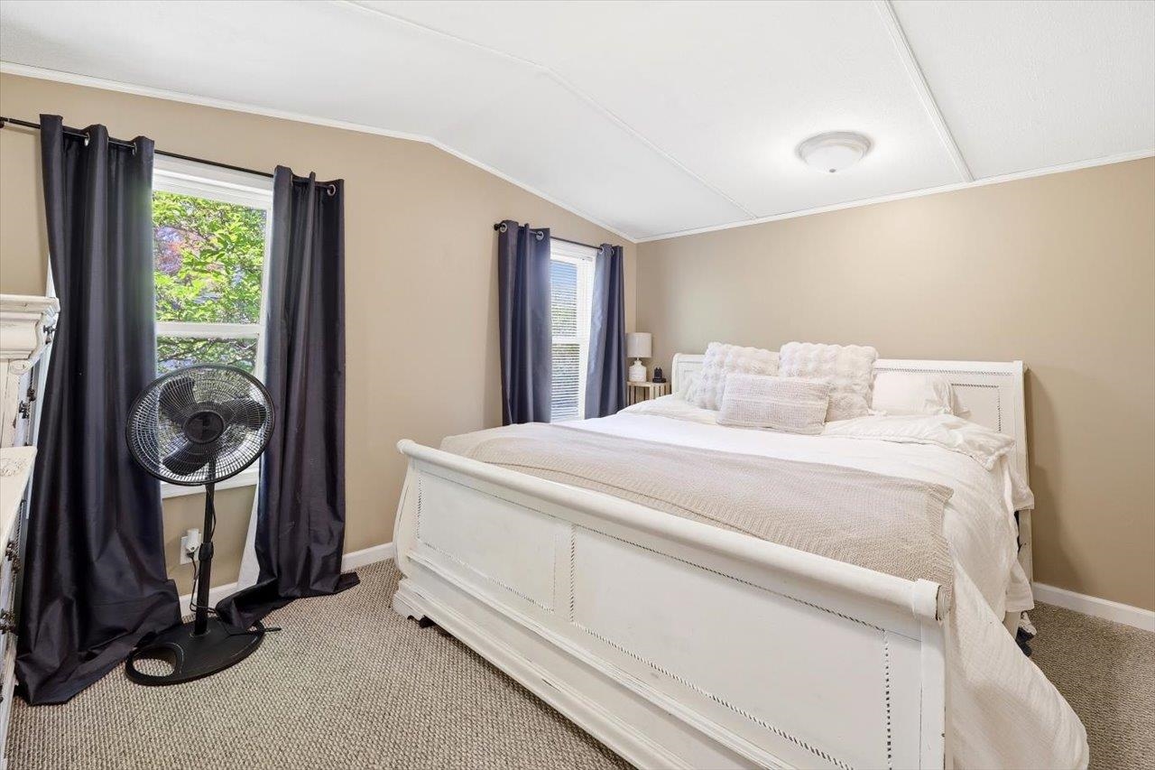 406 Trayfoot Road Grottoes, VA 24441 - Photo 13 of 30 a bedroom with a bed and a mirror