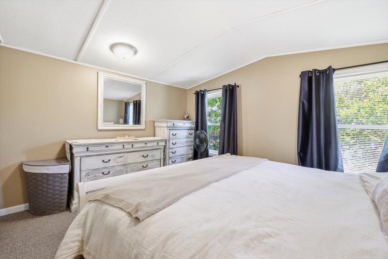 406 Trayfoot Road Grottoes, VA 24441 - Photo 14 of 30 a bedroom with a bed and a dresser
