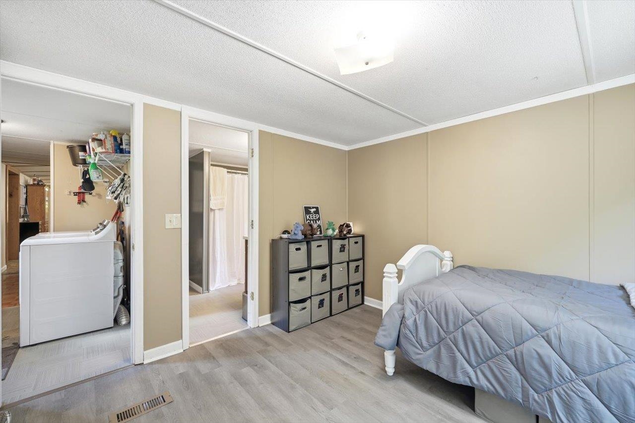 406 Trayfoot Road Grottoes, VA 24441 - Photo 18 of 30 a bedroom with a bed and a window