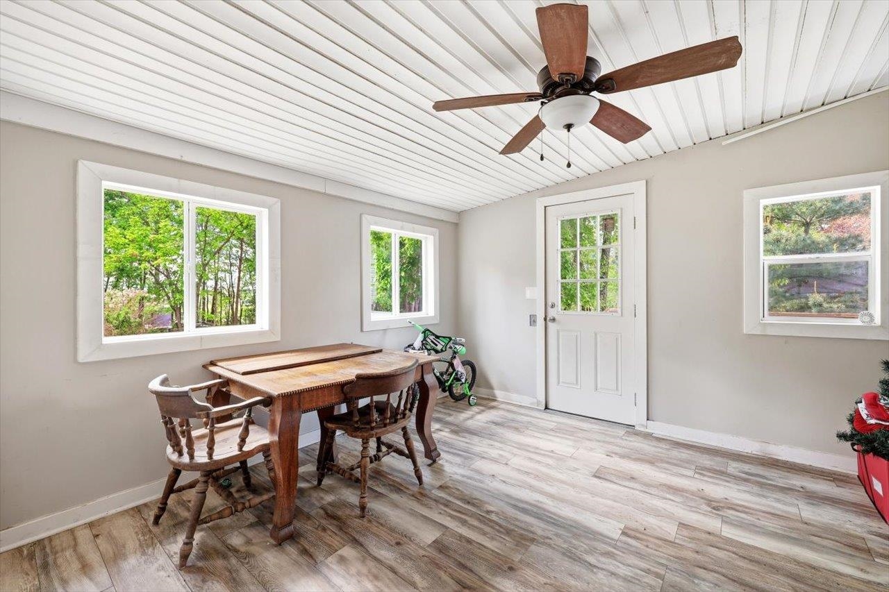 406 Trayfoot Road Grottoes, VA 24441 - Photo 19 of 30 a view of a dining room with furniture window and wooden floor