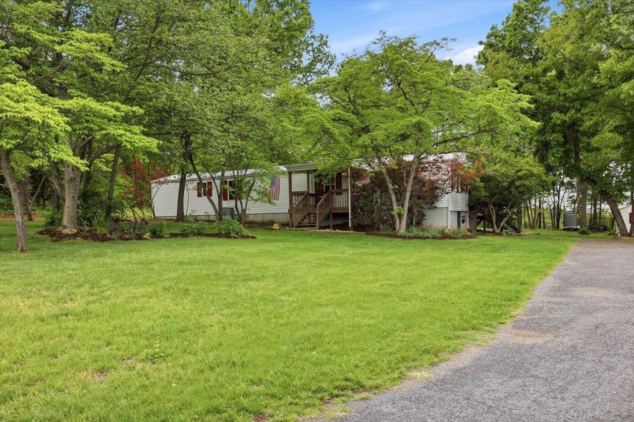 406 Trayfoot Road Grottoes, VA 24441 - Photo 2 of 30 a view of a house with backyard and tree