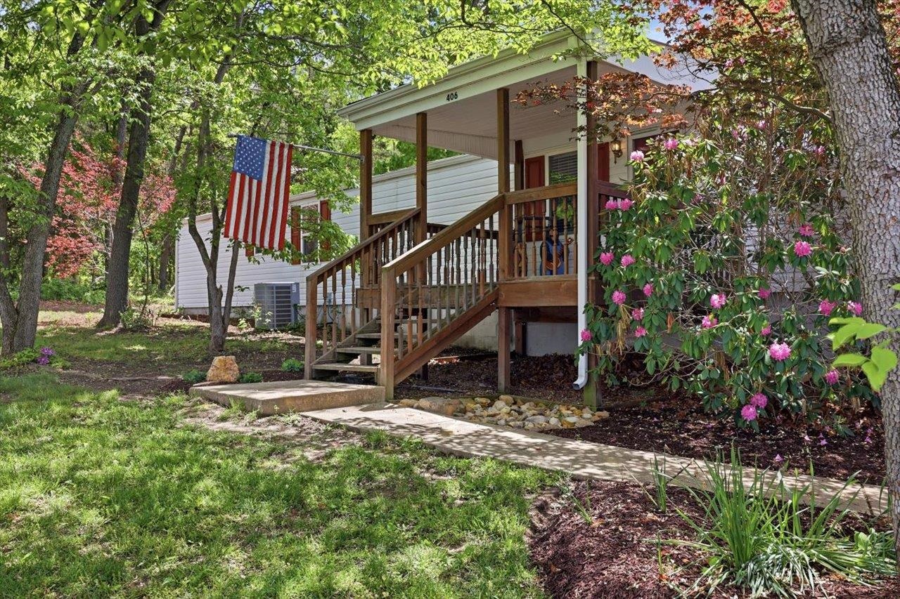 406 Trayfoot Road Grottoes, VA 24441 - Photo 23 of 30 a view of a house with backyard and sitting area