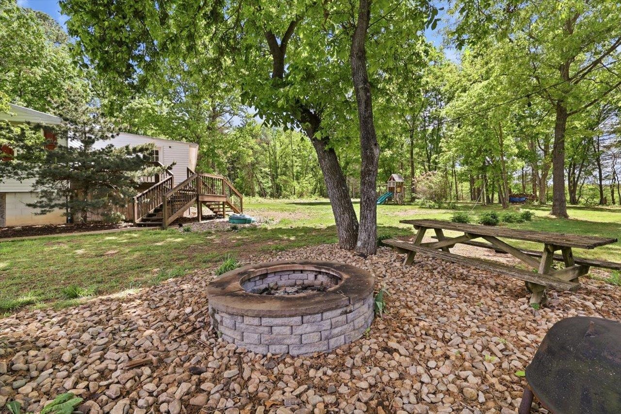 406 Trayfoot Road Grottoes, VA 24441 - Photo 25 of 30 a view of a backyard with trees
