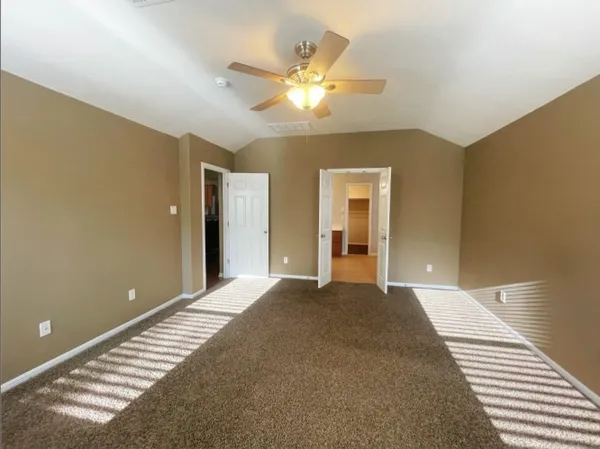 a bathroom with a double vanity sink toilet mirror and shower