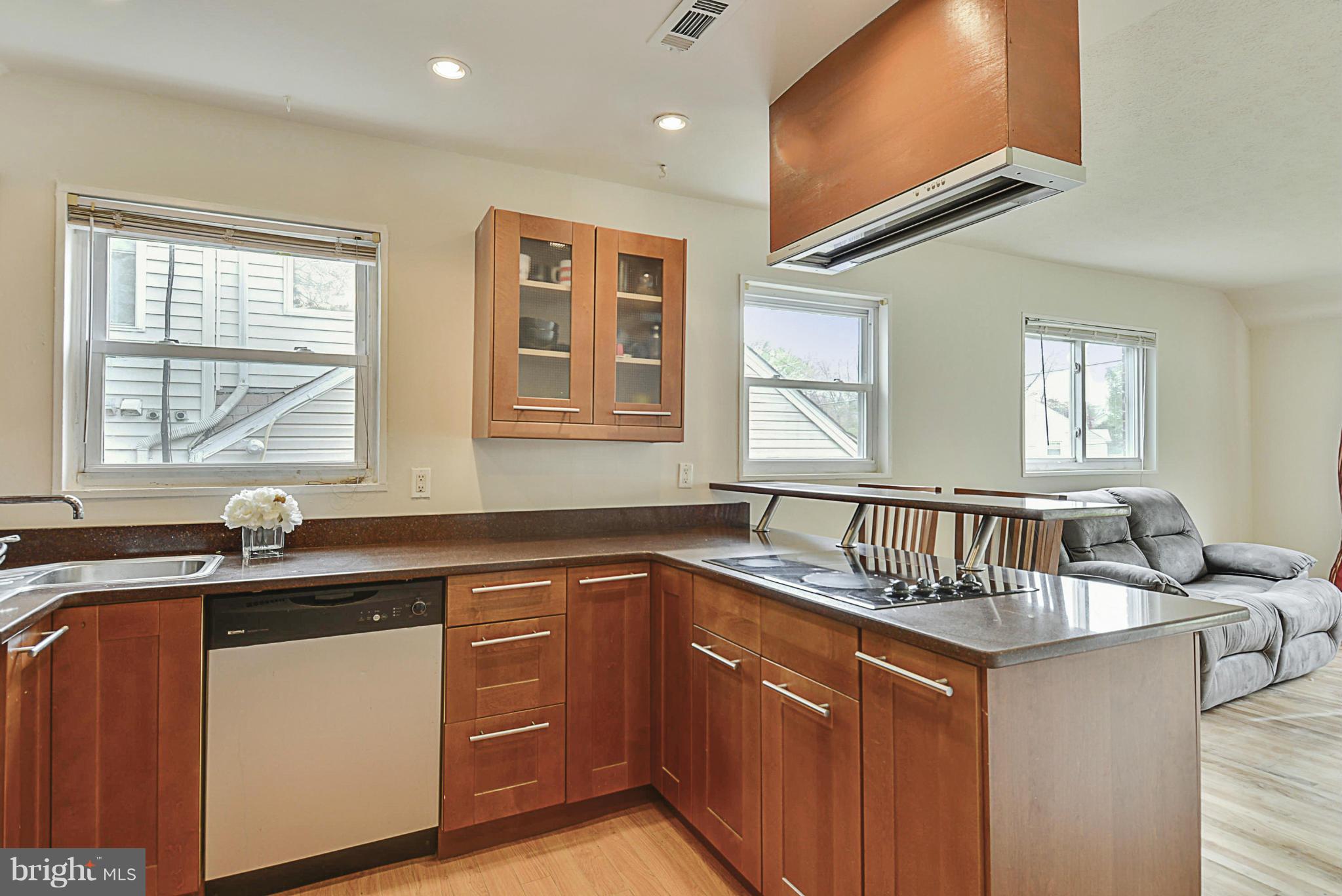 2800 Denley Place Silver Spring, MD 20906 - Photo 1 of 26 a kitchen with granite countertop a sink stove and cabinets