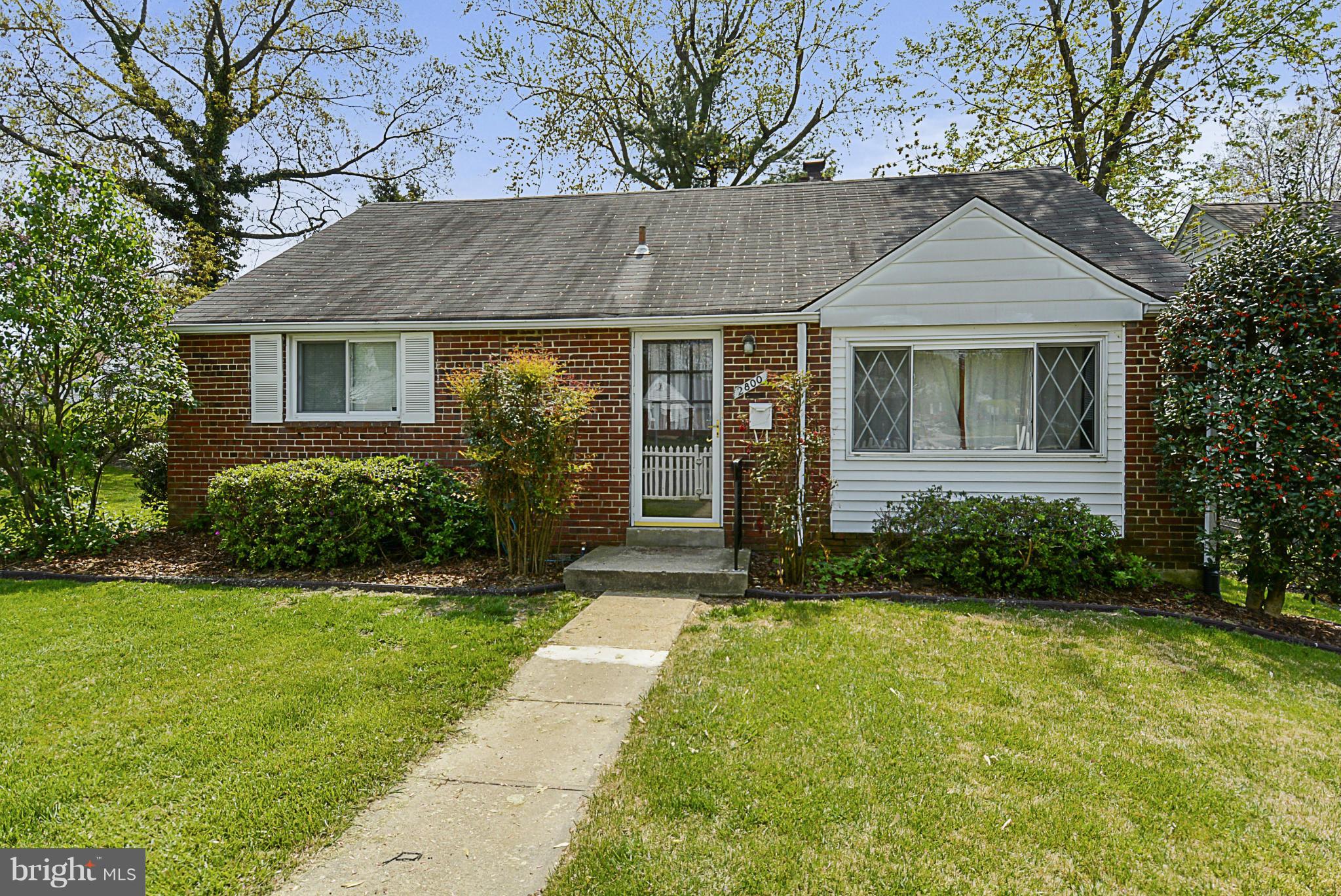 2800 Denley Place Silver Spring, MD 20906 - Photo 5 of 26 a front view of a house with garden