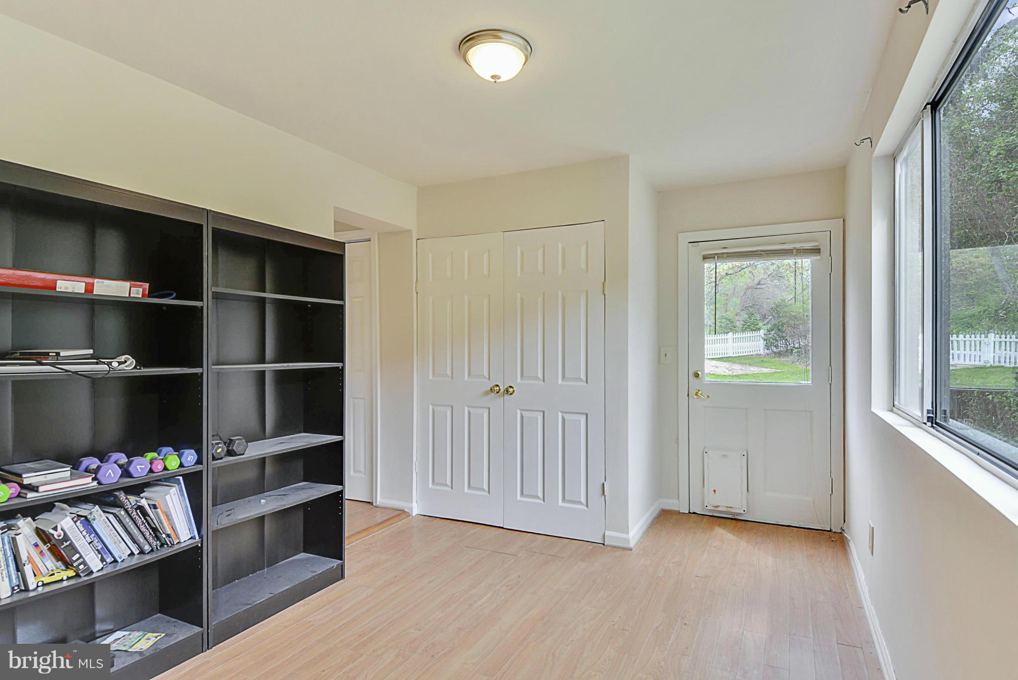 2800 Denley Place Silver Spring, MD 20906 - Photo 10 of 26 a view of walk in closet with clothes and shoes