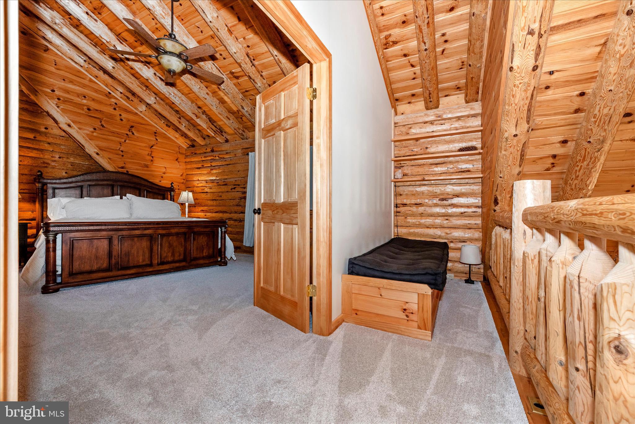 12804 Spruce Run Road Myersville, MD 21773 - Photo 18 of 72 a view of a porch with a bench