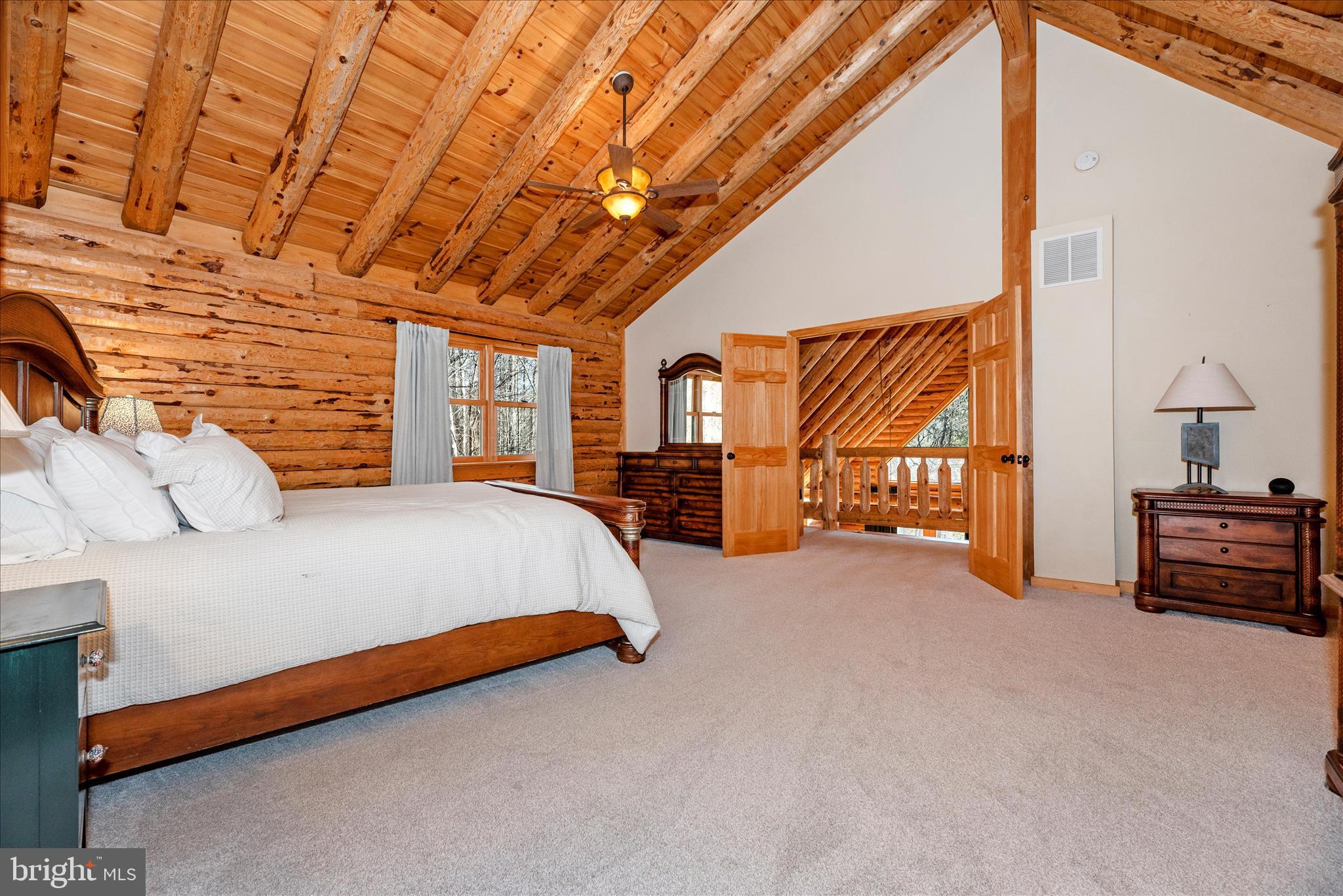 12804 Spruce Run Road Myersville, MD 21773 - Photo 23 of 72 a bed sitting in a spacious bedroom next to a window